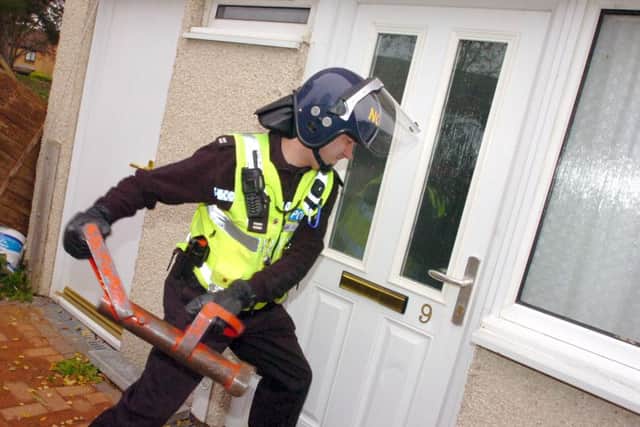 A file photo of a police raid