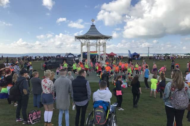 Partygoers at Southsea Bandstand, where the Pride parade completed its journey
