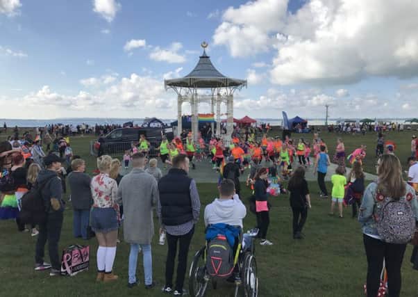 Partygoers at Southsea Bandstand, where the Pride parade completed its journey