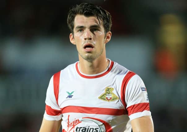 John Marquis couldn't find a way through for Doncaster. Picture: PA
