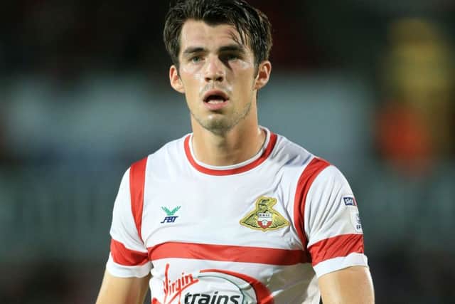 John Marquis couldn't find a way through for Doncaster. Picture: PA