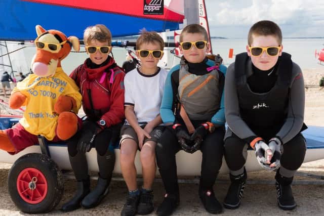 Young sailors from the Stokes Bay Sailing Club. From the left with their mascot are Will, Samuel, Jude and Patrick
Picture: Duncan Shepherd (171249-011)