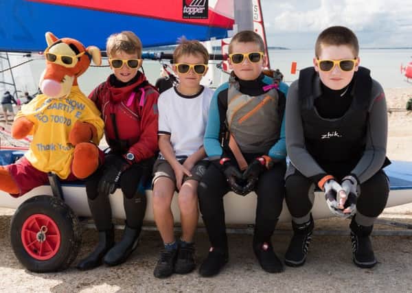 Young sailors from the Stokes Bay Sailing Club. From the left with their mascot are Will, Samuel, Jude and Patrick
Picture: Duncan Shepherd (171249-011)