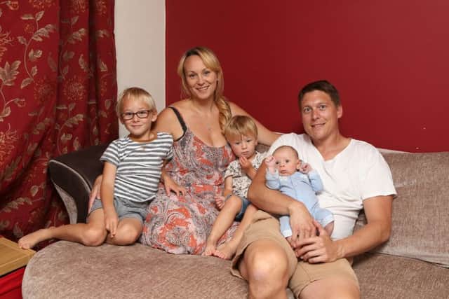 Polly and Jimmy Richards with sons, from left, Dylan aged five, Sonnie, two, and Alfie five weeks Pictures: Habibur Rahman (171134-042)