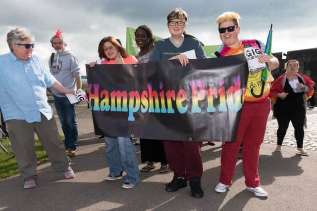 The parade snaking it's way from South Parade Pier to the Bandstand for Portsmouth Pride   Picture: Duncan Shepherd (171248-029)