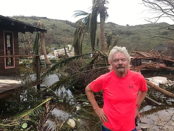 Sir Richard Branson among the debris on his private island Necker caused by Hurricane Irma