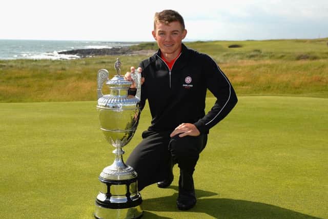 Scott Gregory with The Amateur Championship Trophy Picture: Tony Marshall/R&A