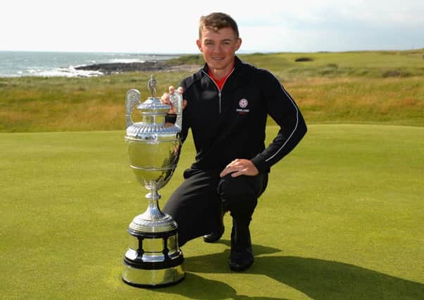 Scott Gregory with The Amateur Championship Trophy Picture: Tony Marshall/R&A