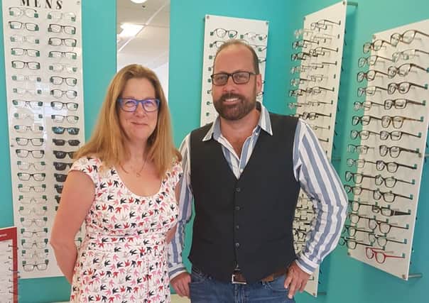 Anne Gill of Anne Gill Eyecare in North End with her 2000th customer, Stephen Melhuish     Picture: Robin Lander Brinkley