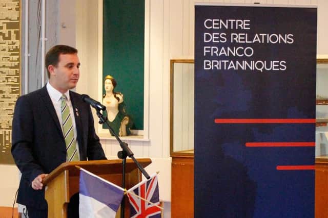Mayor of Ouistreham Romain Bail unveiling plans for a new Centre for Franco-British Relations at Portsmouth Historic Dockyard