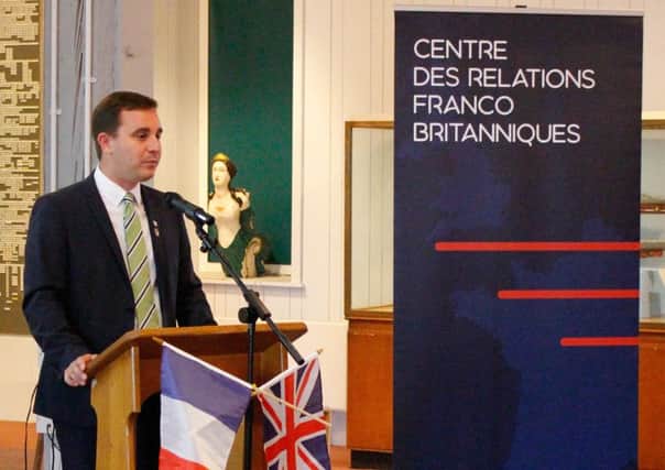 Mayor of Ouistreham Romain Bail unveiling plans for a new Centre for Franco-British Relations at Portsmouth Historic Dockyard