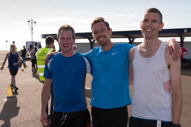Southsea parkrun, left to right: Matthew Salt finished third, Mindaugas Sasnauskas took first place and Damian Spreckley was second. Picture: Duncan Shepherd (171256-024)