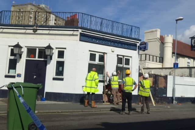 A car has crashed into the Travellers Rest in Somers Road, Portsmouth. Picture: Carl Ross.