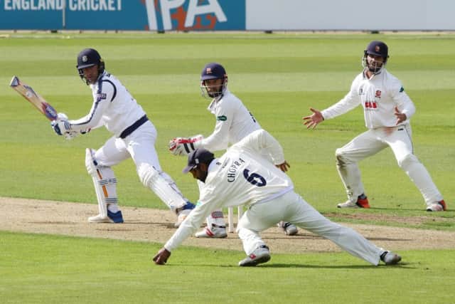 Sean Ervine is caught by Varun Chopra. Picture: Kevin Shipp