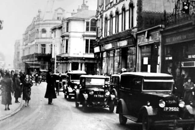 Russell Street, Portsmouth, with the Swears & Wells shop on the right.