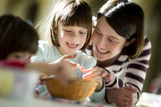 Catherine Cowie and her daughter Jessica enjoy art and craft together at church