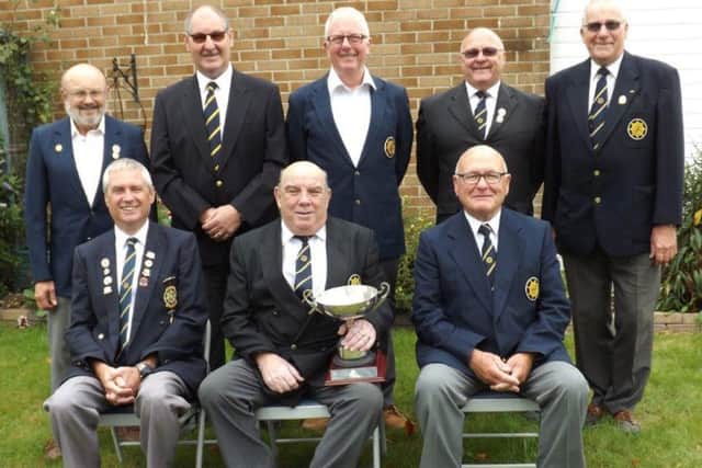 Gosport Forton Bowling CLub team members, back row, left to right: Eric Meighan, Byron Lewis, Mick Lush,
Graham Sampson and Rob Williams
. Front Row, left to right: Steve Anderson, Brian Croucher (team captain
holding cup) and Malcolm Stimpson.