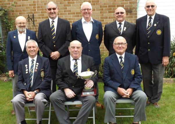 Gosport Forton Bowling CLub team members, back row, left to right:  Eric Meighan, Byron Lewis, Mick Lush,
Graham Sampson and Rob Williams
. Front Row, left to right: Steve Anderson, Brian Croucher (team captain
holding cup) and Malcolm Stimpson.