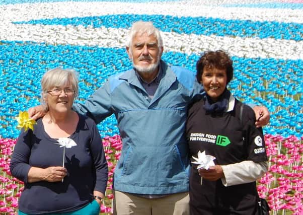 (Left to right) Sue James, Owen Plunkett and Elizabeth Longland from the Portsmouth Oxfam Group