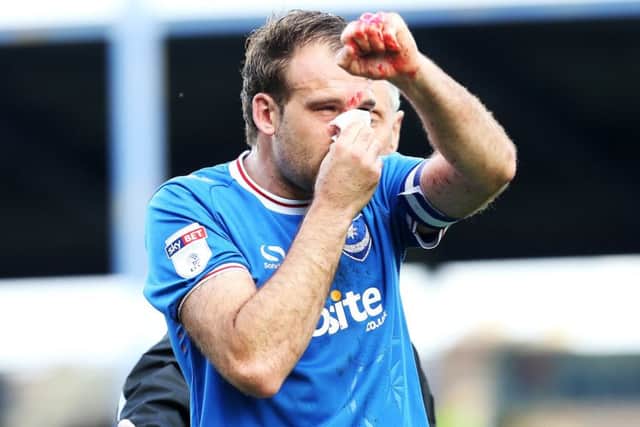 Brett Pitman broke his nose when giving Pompey the lead against Fleetwood Picture: Joe Pepler