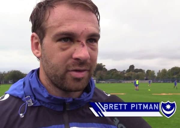 Pompey skipper Brett Pitman sports two black eyes and a broken nose today