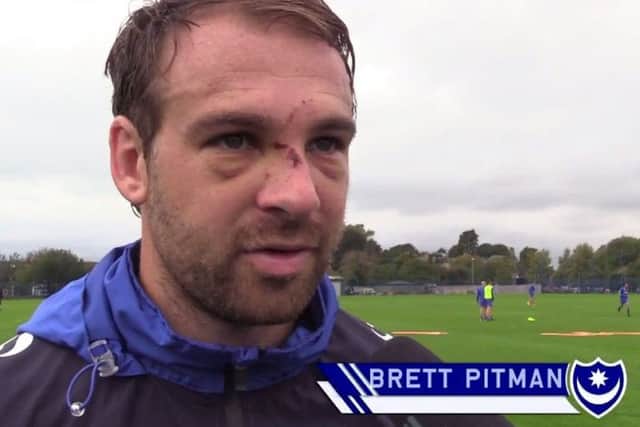 Pompey skipper Brett Pitman sports two black eyes and a broken nose today