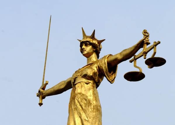 The famous statue of "Lady Justice" Picture: Ian Nicholson/PA Wire