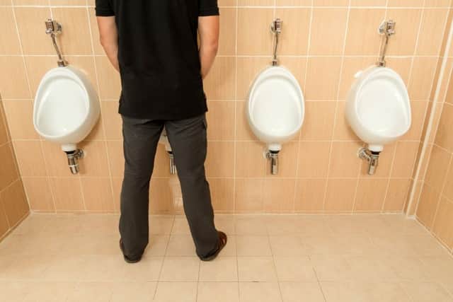 Men simply stand, jiggle about, and walk out (Shutterstock)