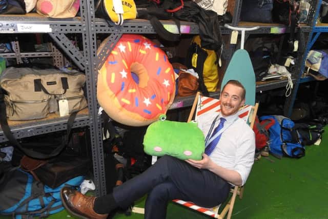 Michael Pugh with some of the lost property items left on South Western Railway trains