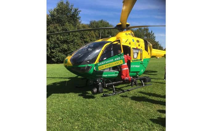 The air ambulance at Foxes Forest in Hilsea today after a man's body was discovered Picture: Mark Hummerstone
