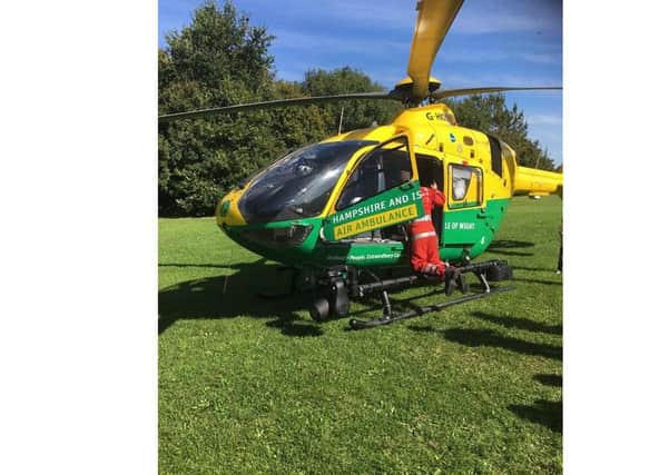 The air ambulance at Foxes Forest in Hilsea today after a man's body was discovered Picture: Mark Hummerstone