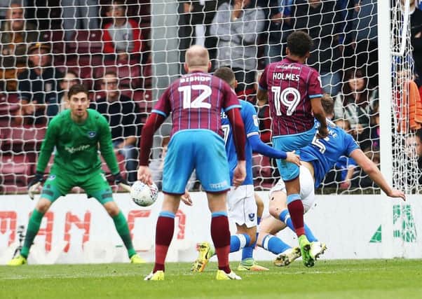 Duane Holmes hands Scunthorpe a 2-0 lead against Pompey at Glanford Park following a mistake by Blues defender Dion Donohue Picture: Joe Pepler