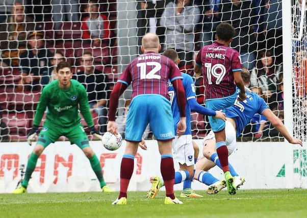 Duane Holmes scores Scunthorpe's second goal on Saturday following a mistake from Dion Donohue Picture: Joe Pepler