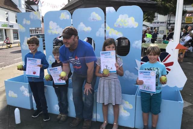 FRUITY FUN You're never too young to enjoy what nature has to offer. Children with their apple pressing certificates
Pictures: Alistair Gibson, John Tweddell and Steve Bone