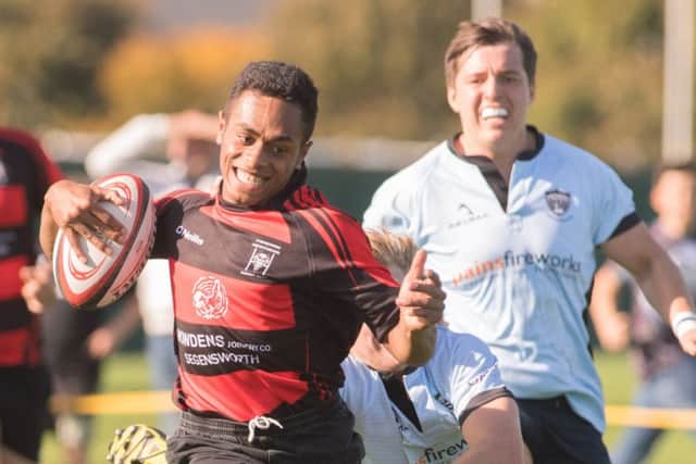 Steve Devoy with the first of his two tries. Picture: Keith Woodland