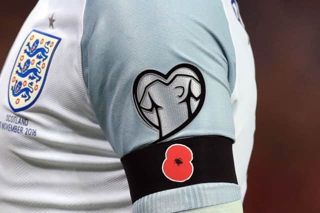 Fifa has backed down on its row of players wearing poppies. Picture: Mike Egerton/PA Wire