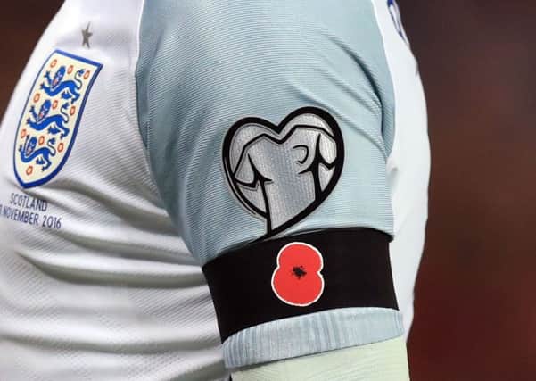 Fifa has backed down on its row of players wearing poppies. Picture: Mike Egerton/PA Wire