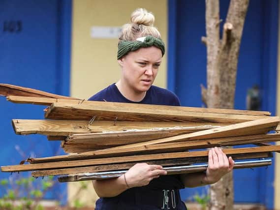 Members of the ship's company of HMS Ocean gave aid to hurricane victims