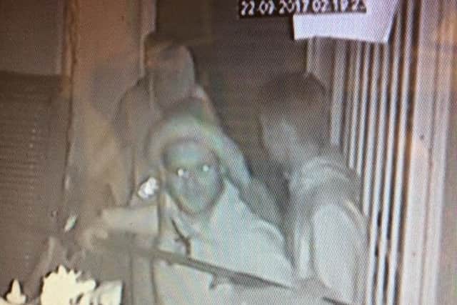 A CCTV image of vandals who andals broke into Southsea Model Village
