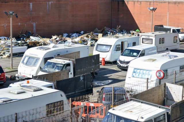 Travellers at the former Holloway site