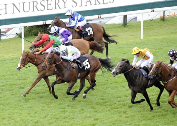 :Billesdon Brook, red cap, bids for another victory at Goodwood. Picture: Malcolm Wells