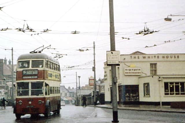 Silent, no pollution, no fumes and cheap to run. Why did we get rid of them? A trolleybus passing the White House pub in Milton (Tony Belton)