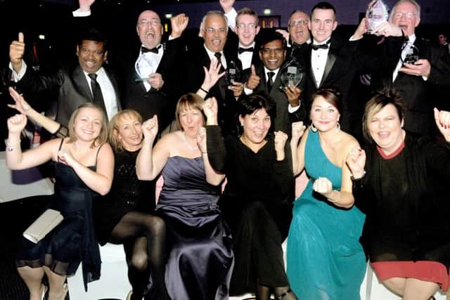 The team at Gemma Lighting celebrate after winning Overall Business of the Year in 2013