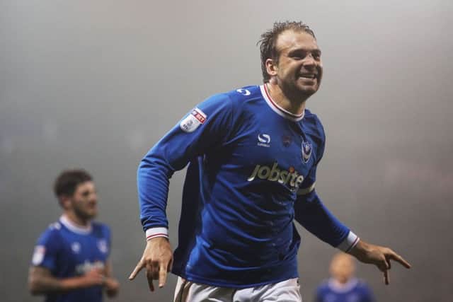 Pompey skipper Brett Pitman celebrates after scoring his second goal. Picture: Joe Pepler