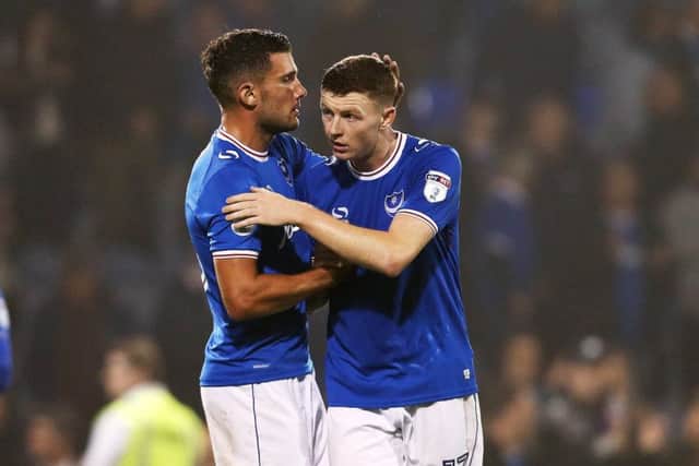 Gareth Evans, left, congratulates Dion Donohue. Picture: Joe Pepler