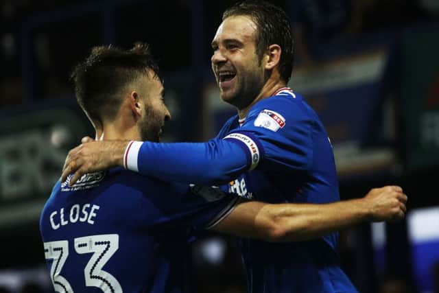 Brett Pitman celebrates his second goal against Bristol Rovers. Picture: Joe Pepler