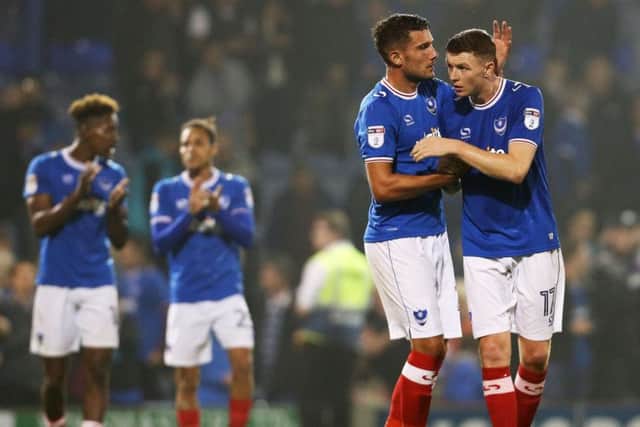 Pompey players lap up the applause after the win