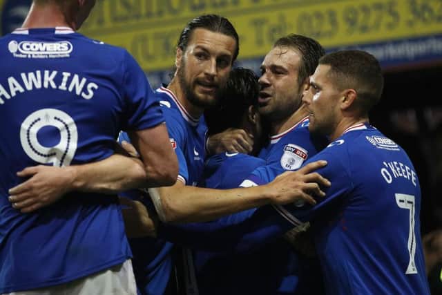 Pompey celebrate Brett Pitman's second goal against Bristol Rovers. Picture: Joe Pepler