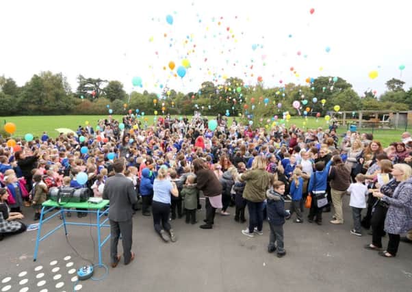 Children at Front Lawn Primary Academy releasing balloons to celebrate the school's 60th anniversary
Picture: Habibur Rahman