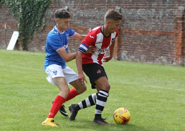 Josh Flint in action for Pompey Academy